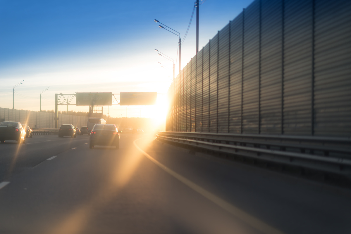 a sound barrier next to a freeway